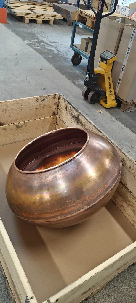  Detail of spun copper vessel showing precision metal spinning and welding for pharmaceutical equipment.