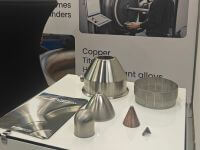 Olsen Metaltrykkeri på messe med metalspinning til defence
